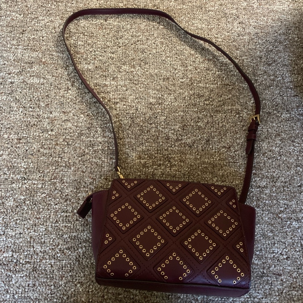 Michael Kors small plum colored handbag